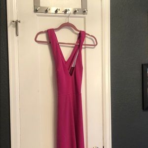 Crossed back pant leg romper